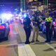 Police stand near a barricade following the sniper shooting in Dallas July 7, 2016, that left five police officers dead and six injured.
LAURA BUCKMAN/AFP/Getty Images